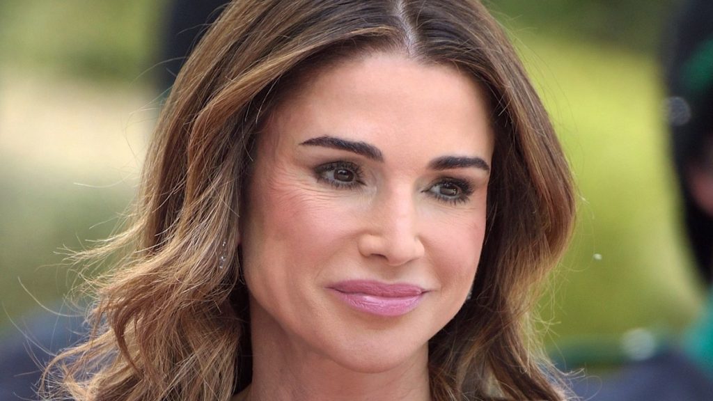 Queen Rania is sublime in two-piece glance and darkish glasses on sombre instance