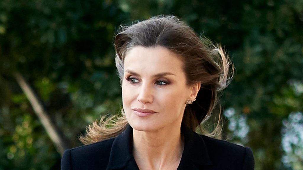 Queen Letizia fashions lace veil and shin-skimming get dressed in poignant tribute