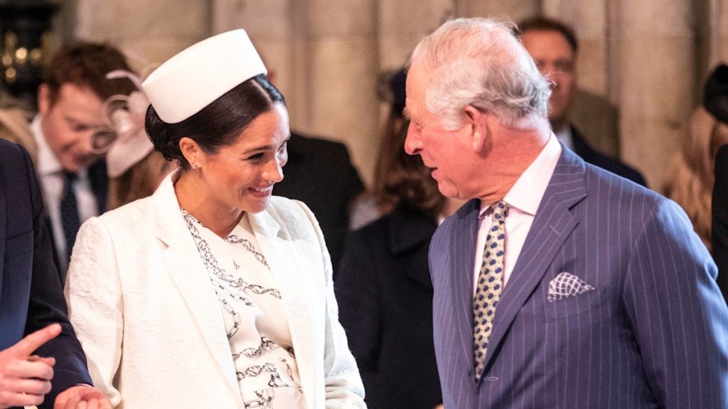 King Charles kisses daughter-in-law Meghan Markle in resurfaced marriage ceremony photograph