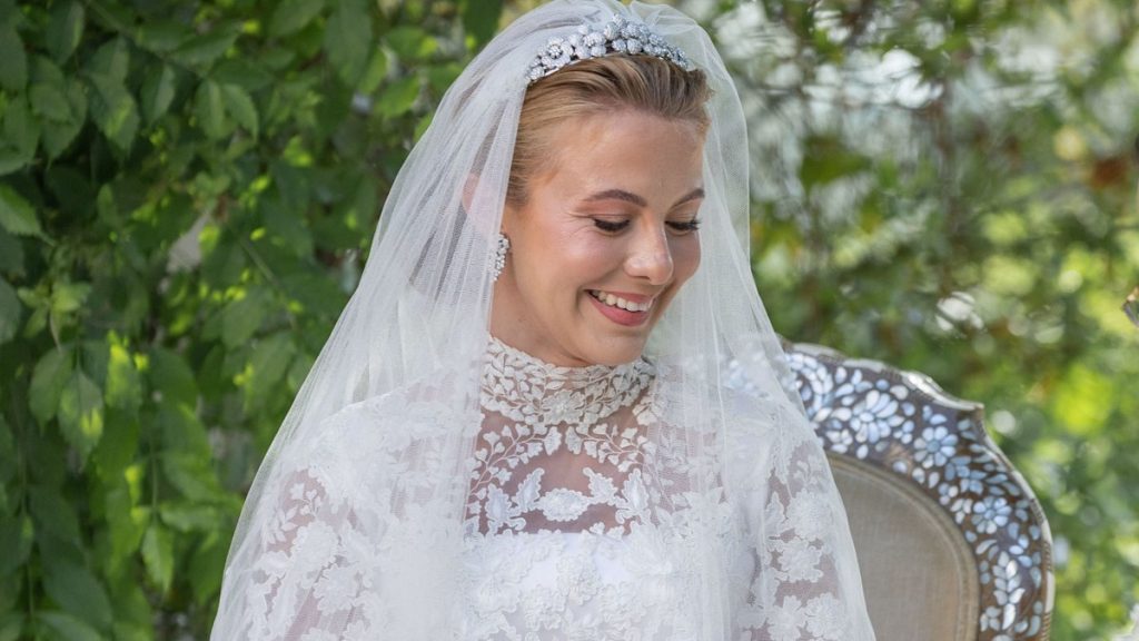 Queen Rania’s niece fashions corset and sheer lace bridal robe in professional wedding ceremony footage