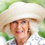 Queen Camilla cuddles cute pet Moley within house she does not proportion with King Charles