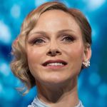 Princess Charlene has a Cinderella second in Louis Vuitton robe