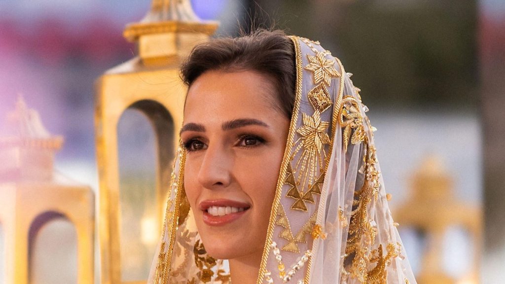 Princess Rajwa makes head-turning adjustment to sheer wedding ceremony visitor robe