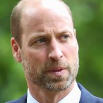 Sombre Prince William holds again tears at memorial provider in London