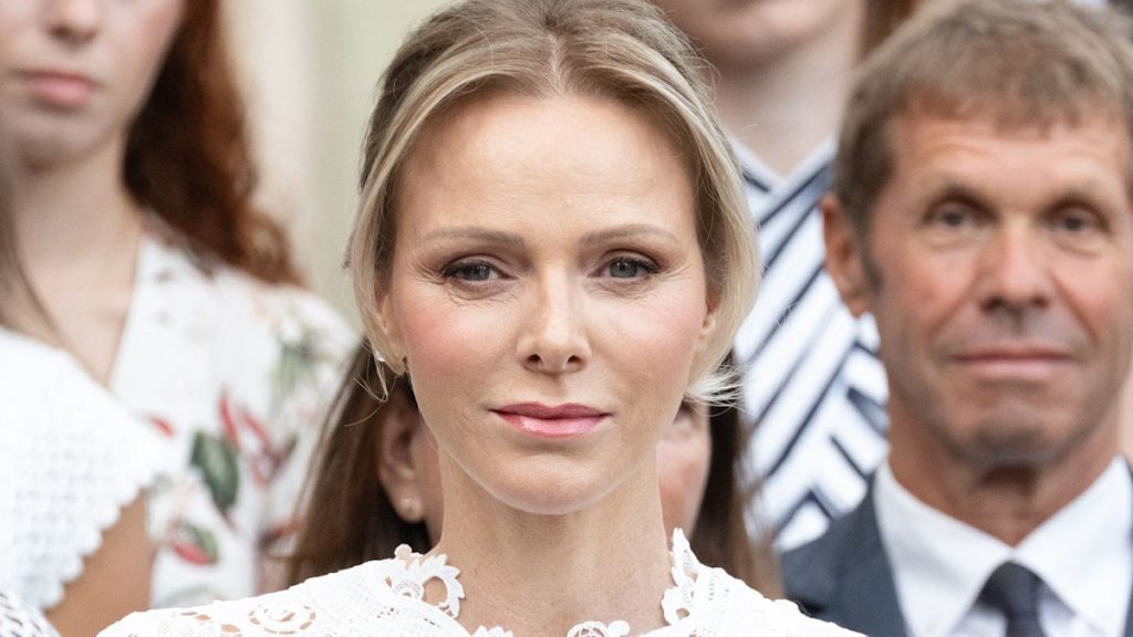 Princess Charlene re-emerges along kids in cut-out robe