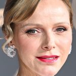 Princess Charlene is a pink carpet bombshell in slinky backless robe