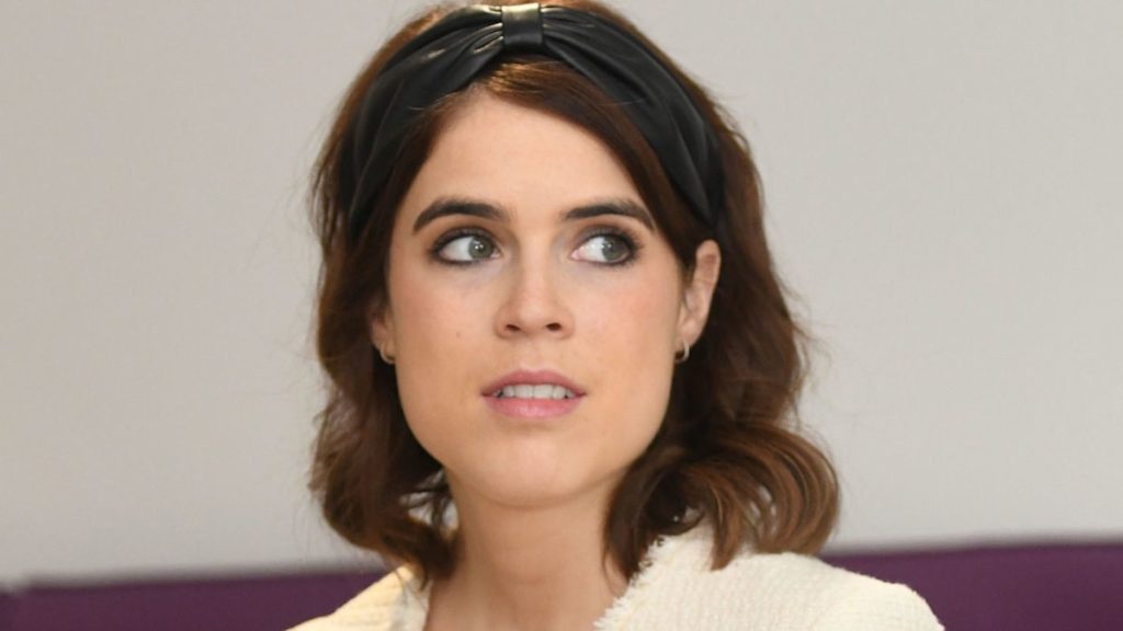 Princess Eugenie is radiant in silky slip skirt and knee-high boots for touching day out