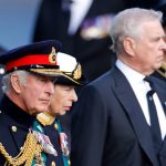 Why was once Andrew given the surname Mountbatten-Windsor?