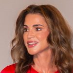 Queen Rania offers crimson scorching robe a flirty twist with shorter hemline